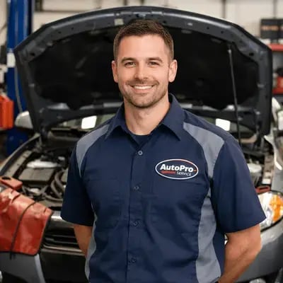 Auto Service Technician At Work