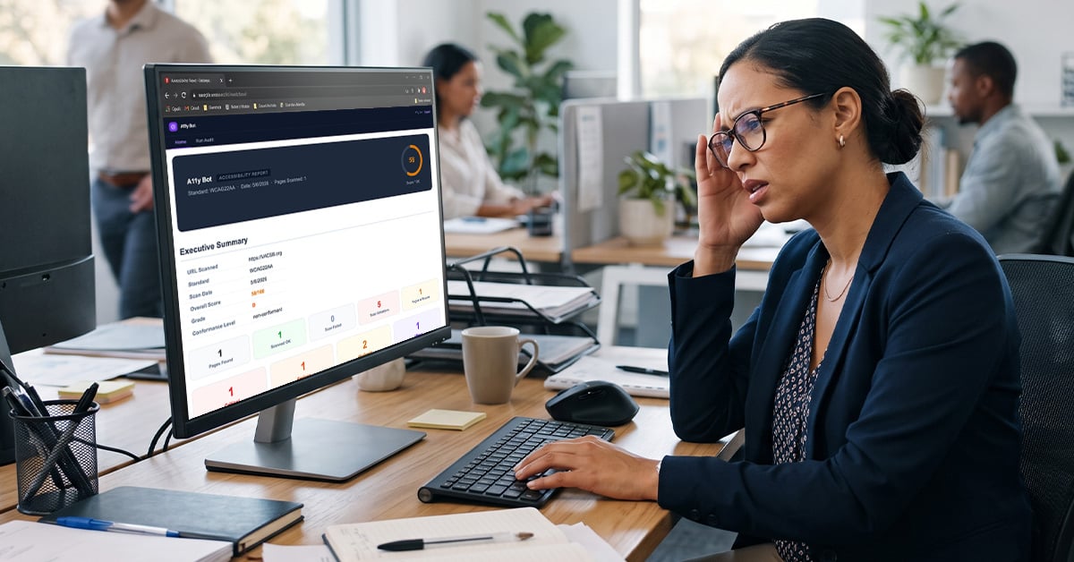 Woman reviewing a website accessibility audit report on her computer, showing multiple compliance issues that need attention.