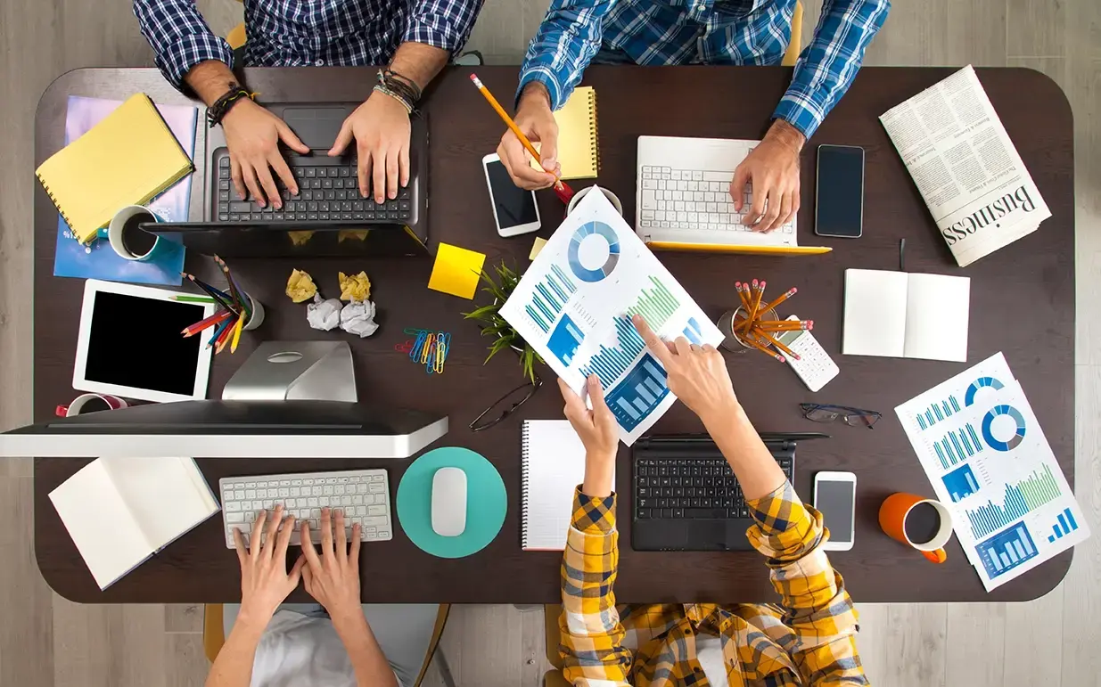 marketers working at a table